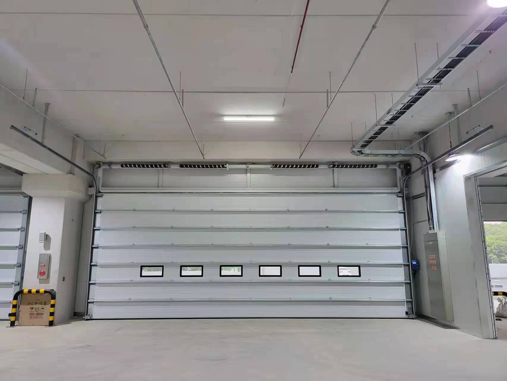 Perché un portone sezionale può risolvere ben più che semplici problemi di accesso?